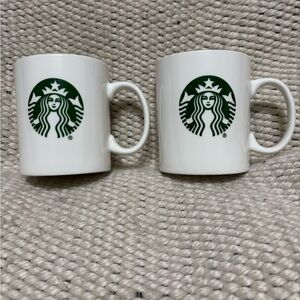 Set of 2 Starbucks mugs in perfect condition from 2014 collection. 14 oz.